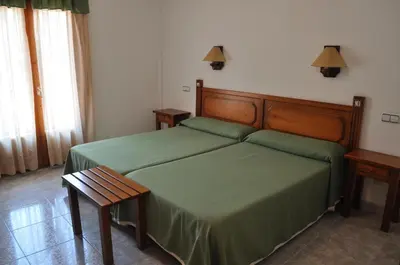 Cama o camas de una habitación en Hotel Latre