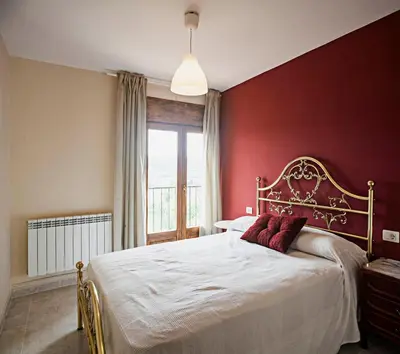 Cama o camas de una habitación en Casa rural la Era del Malaño