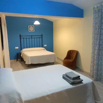 Cama o camas de una habitación en Casa rural la Era del Malaño