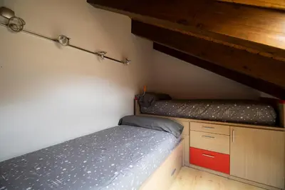 Cama o camas de una habitación en Inmocyma Prau Llargo