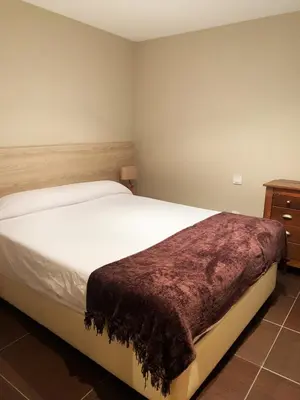 Cama o camas de una habitación en Apartamentos Lorione