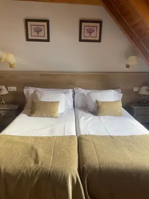 Cama o camas de una habitación en Hostal Escuils