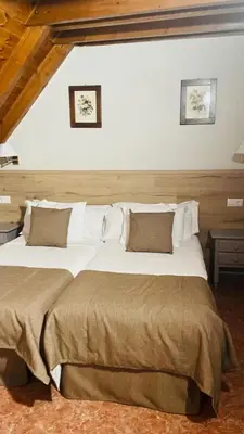 Cama o camas de una habitación en Hostal Escuils