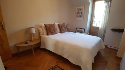 Cama o camas de una habitación en Atico duplex Urb La Viña en Biescas