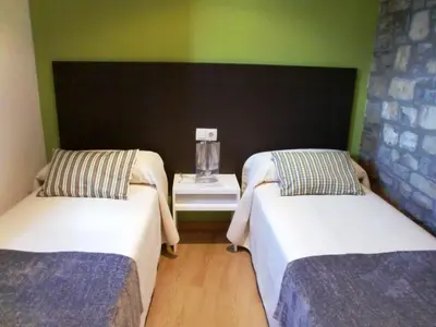 Cama o camas de una habitación en El Mirador de Ainsa