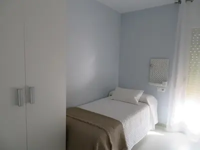 Cama o camas de una habitación en Alcañiz Flats II