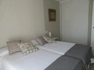 Cama o camas de una habitación en Alcañiz Flats II