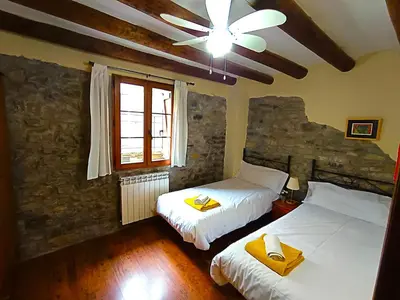 Cama o camas de una habitación en Casa Pirinea Ordesa