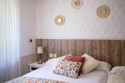 Cama o camas de una habitación en Casa Maza Apartamentos