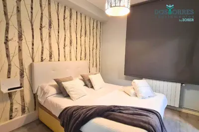 Cama o camas de una habitación en Dos Torres Bárbol - Jacuzzi privado