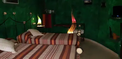 Cama o camas de una habitación en Hotel Cueva Tardienta Monegros-Adults Only