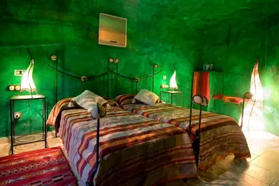 Cama o camas de una habitación en Hotel Cueva Tardienta Monegros-Adults Only
