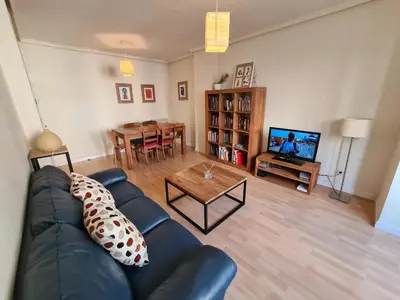 Una televisión o centro de entretenimiento en Dos Torres Boromir - en el Corazón de la Ciudad