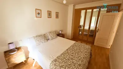 Cama o camas de una habitación en Dos Torres Boromir - en el Corazón de la Ciudad