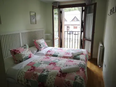 Cama o camas de una habitación en Apartamentos Aguas Limpias