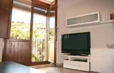 Una televisión o centro de entretenimiento en Apartamento Angel e Isabel