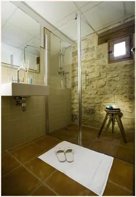 Un baño de Apartamentos Doña Candida