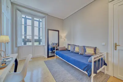 Cama o camas de una habitación en Pensión Mendi