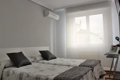 Cama o camas de una habitación en Pension Mayte