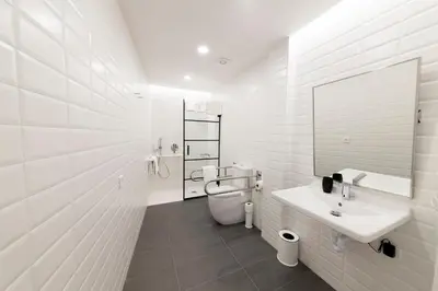 Un baño de Antique Pamplona Tres Reyes Apartments