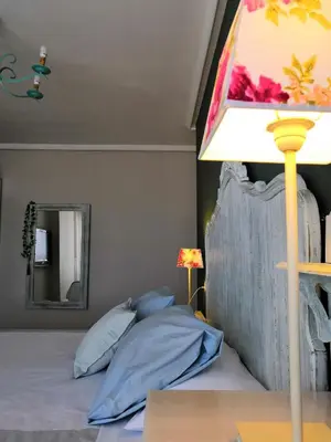 Cama o camas de una habitación en La Parada Santo Domingo 1