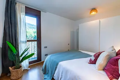 Cama o camas de una habitación en El Nido del Pirineo Estilo y Calidez en Villanúa