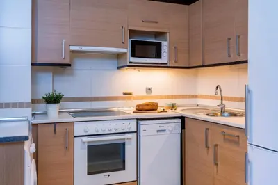 Una cocina o zona de cocina en El Nido del Pirineo Estilo y Calidez en Villanúa