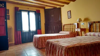 Cama o camas de una habitación en Casa Blasco