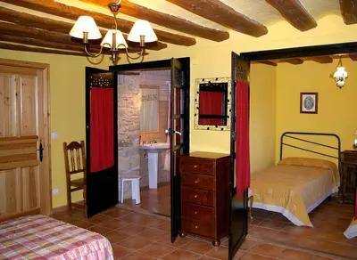 Cama o camas de una habitación en Casa Blasco