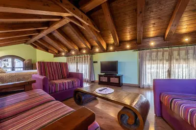 Una televisión o centro de entretenimiento en Apartamentos Casa Rivera