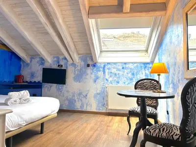 Una televisión o centro de entretenimiento en La Posada d'Àneu by RdA Hotels