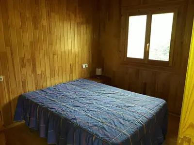 Cama o camas de una habitación en Sabiñanigo Camp & Hotel