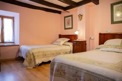 Cama o camas de una habitación en Casa Navarlaz S N