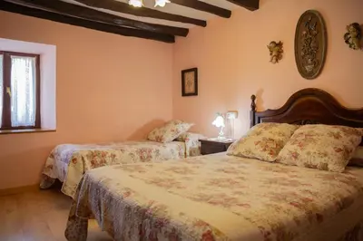 Cama o camas de una habitación en Casa Navarlaz S N