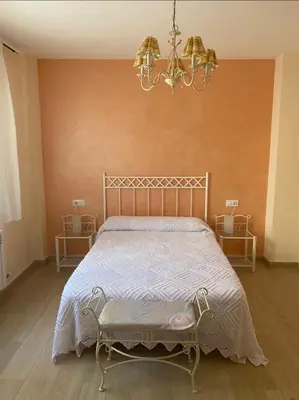 Cama o camas de una habitación en Hostal Sara