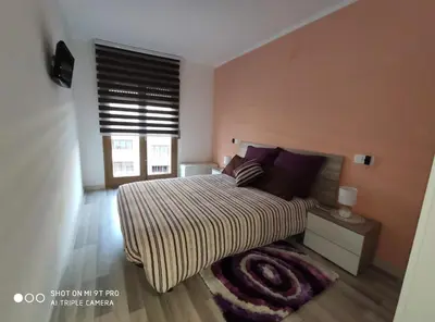 Cama o camas de una habitación en Apartamento confort I