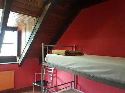 Cama o camas de una habitación en Alberg Les Daines