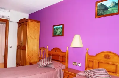 Cama o camas de una habitación en Hostal Rural Casa Castro