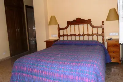 Cama o camas de una habitación en Hostal Rural Casa Castro