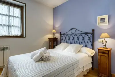 Cama o camas de una habitación en Unifamiliar El Pueyo de Jaca, Panticosa