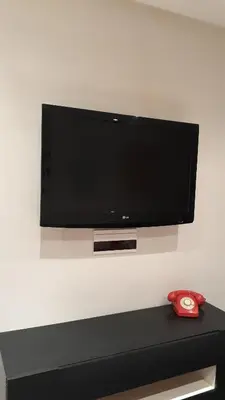 Una televisión o centro de entretenimiento en Apartamento Manuela Sancho