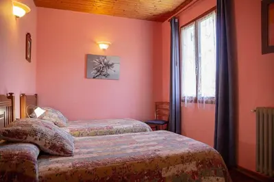 Cama o camas de una habitación en CASA RURAL TOKI ONA
