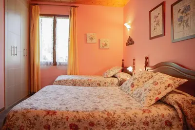 Cama o camas de una habitación en CASA RURAL TOKI ONA