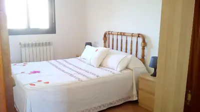 Cama o camas de una habitación en turismo rural del somontano (Alquiler de apartamentos)