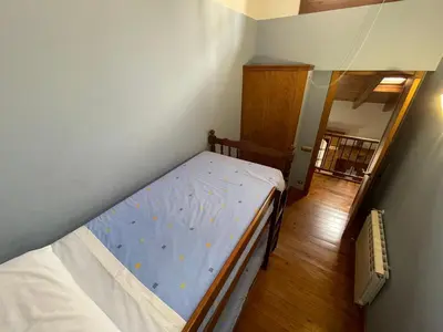 Cama o camas de una habitación en CAN LLORENÇ