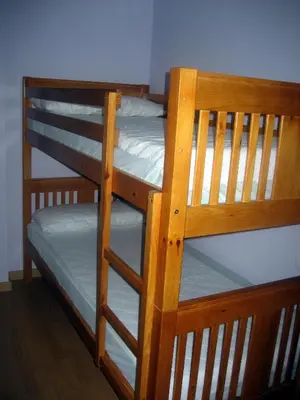 Cama o camas de una habitación en Albergue Turístico Rio Aragon