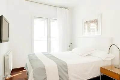 Cama o camas de una habitación en Apartamentos Sabinas El Pilar