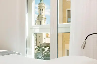 Cama o camas de una habitación en Apartamentos Sabinas El Pilar
