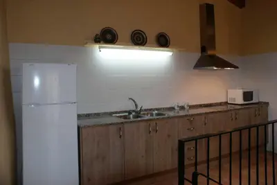 Una cocina o zona de cocina en Conjunt Rural Cal Soldat