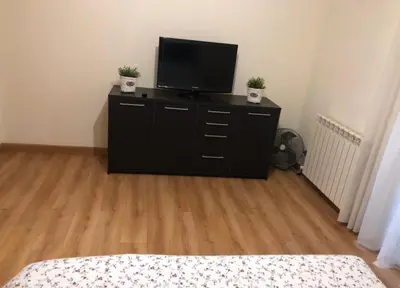 Una televisión o centro de entretenimiento en EL CAPRICHO de NAGORE - Lic UAT678